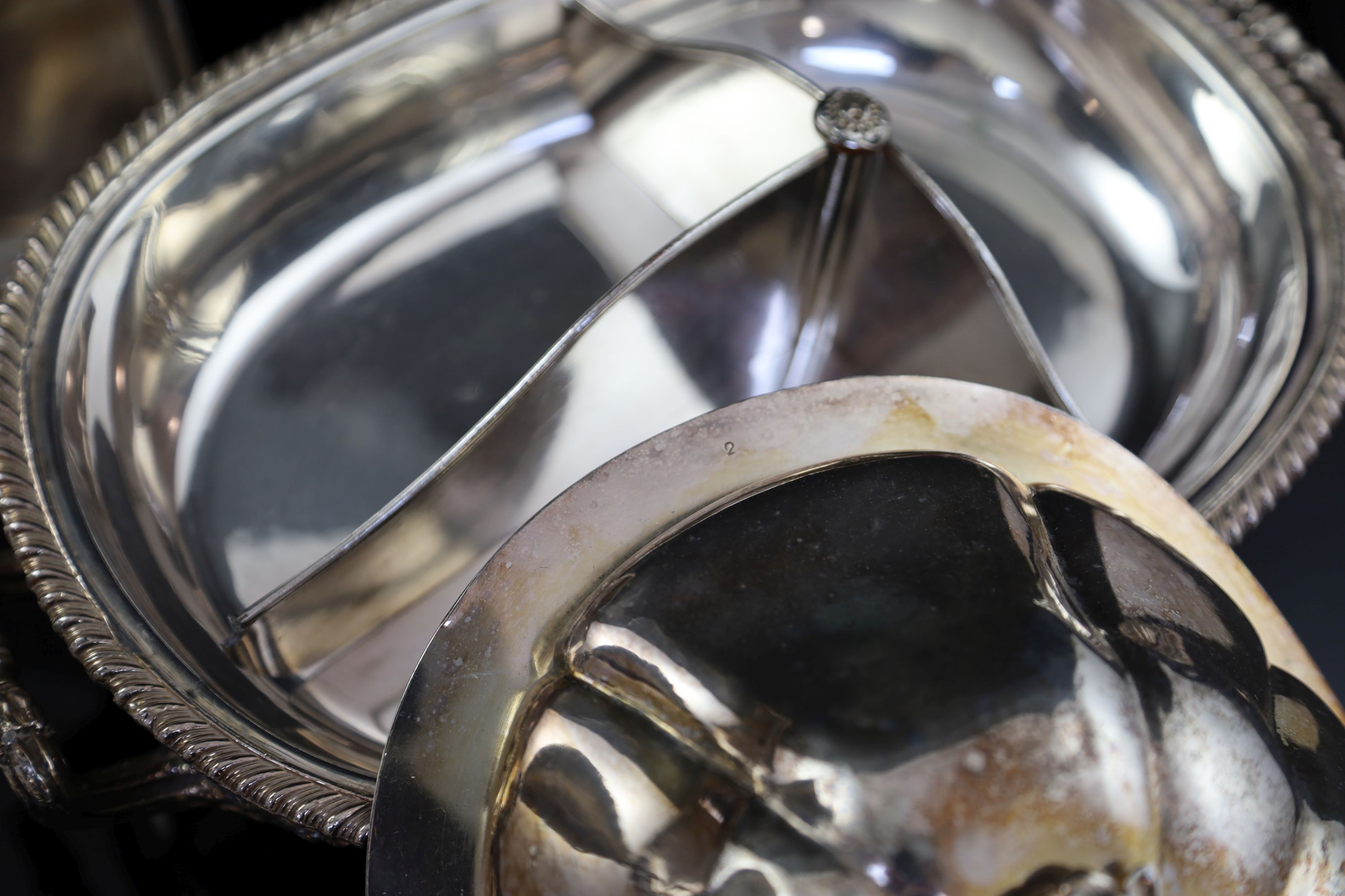 A Continental white metal cup and cover, 35.5cm, 14.5 oz, a silver plated tureen and a rectangular dish